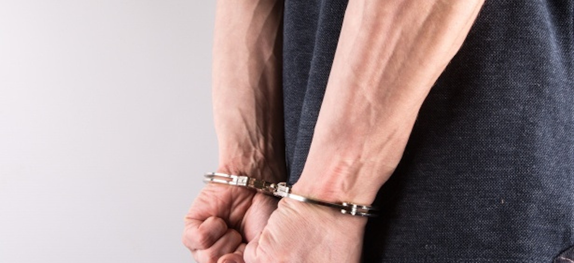 Hands in handcuffs 1462608294 Qt0 Google